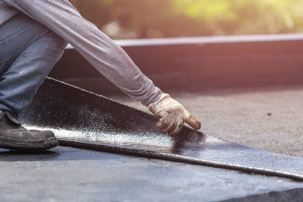 Professional Basement Waterproofing technician working in Branchport, NY